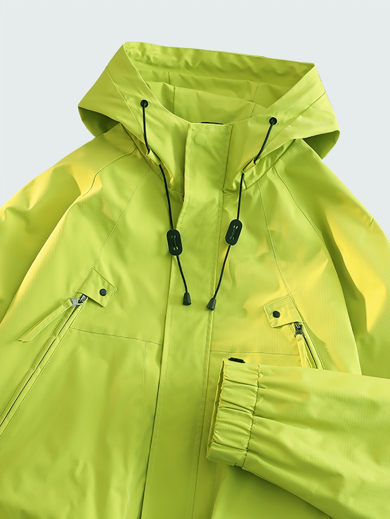 Waterproof Windproof Hooded Jacket - Soft and Cozy with Zip Pockets, Loose Fit, and Adjustable Hood for Ultimate Comfort - Ideal for Outdoor Enthusiasts in Spring and Fall, Perfect for Hiking, Trekking, Fishing, Mountaineering, Travel, and Sports