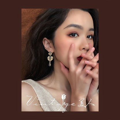 sengpan new personality and fashion temperament palace baroque water drop inlaid retro wind dark girl socialite earrings earrings