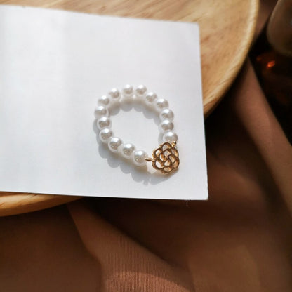 sengpan Christmas decor ideas Hollow Flower Pearl Beaded Elastic Lady Ring Fashion Metal Flower Lady Adjustable Ring New Jewelry Gift