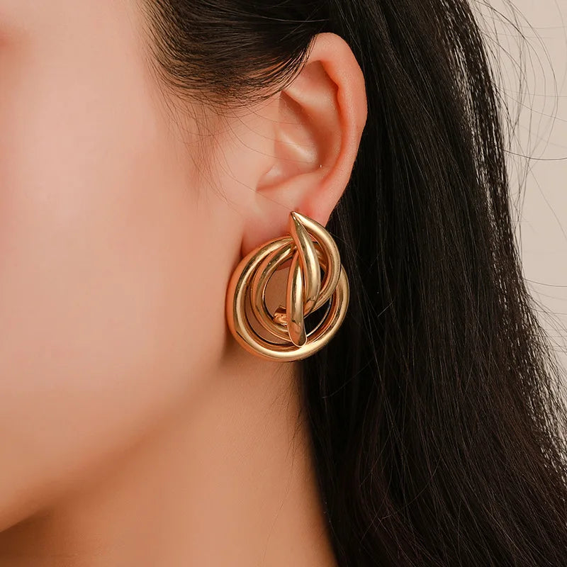 sengpan Simple Fashion Gold Color Spiral Twist Knot Earrings For Women Irregular Metal Stud Earrings Statement Jewelry Party Accessories