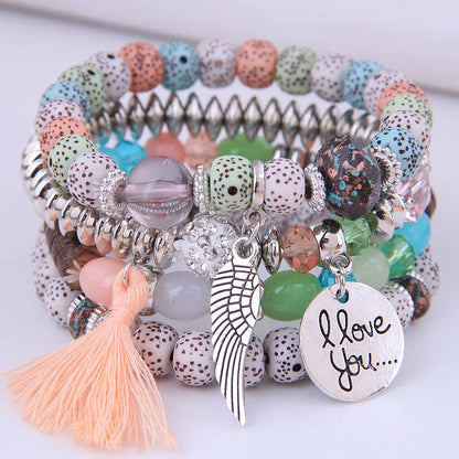 sengpan  Bohemian Multicolor Pink Crystal Beads Bracelets Women Girls Elastic Tassel Wing Letters Rope Bracelet Pulseira Feminina