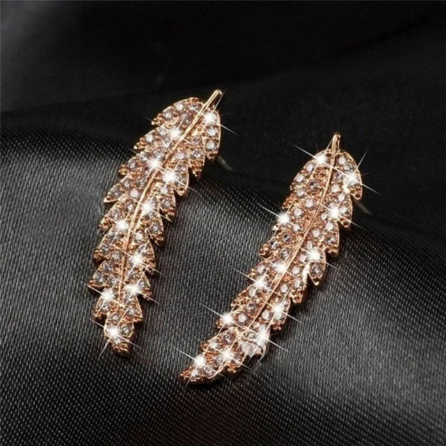 sengpan Trendy CZ Crystal Leaf Feather Earrings Ear Climber Stud Earrings For Women Everyday Jewelry Jacket Ear Cuff Piercing Bronics