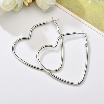 sengpan Hiphop Exaggerated Irregular Metal Dangle Earrings Spiral Twist Knot Geometry Round Smooth Rock Ear Brincos Jewelry Gift