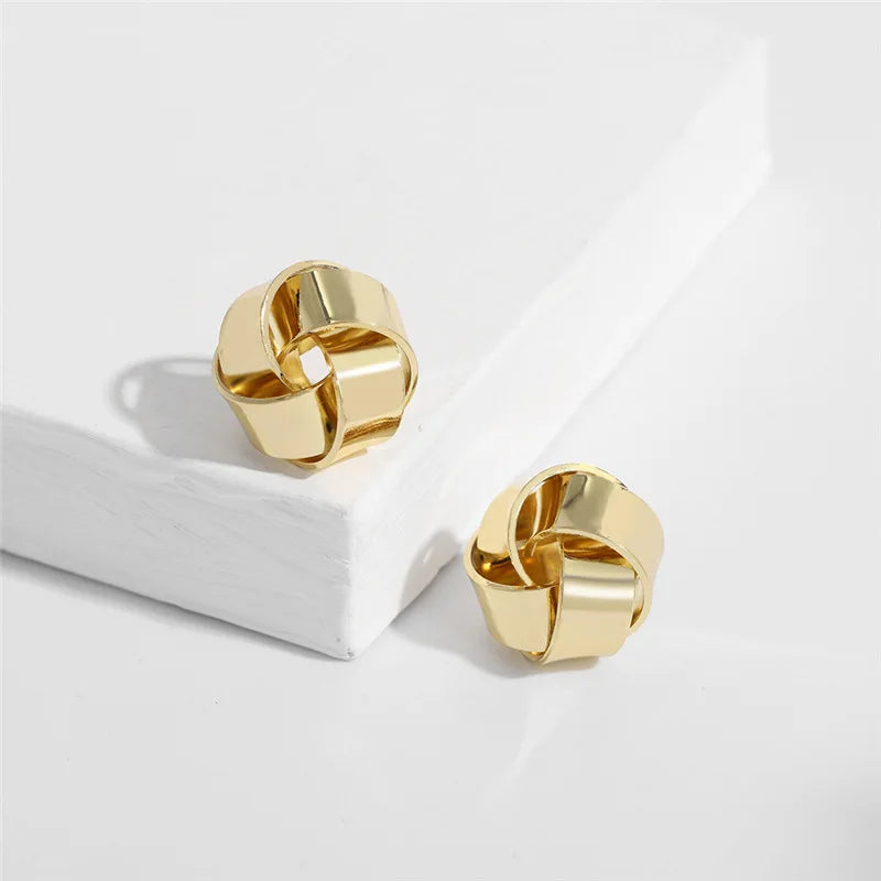 sengpan Glossy Twisted Flower Metal Stud Earrings Female Gold Color Personality Creative Fashion Windmill Button Small Ear Jewelry