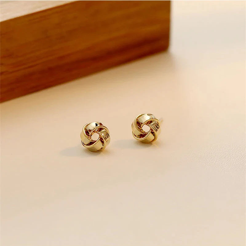 sengpan Glossy Twisted Flower Metal Stud Earrings Female Gold Color Personality Creative Fashion Windmill Button Small Ear Jewelry