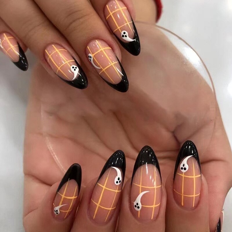 sengpan current nail trends 2023   24Pcs Halloween Long Stiletto False Nails Almond Fake Nails with Ghost Design Press on Nails Wearable Full Cover Manicure Tips