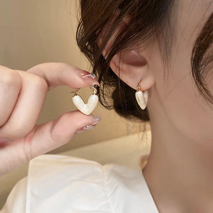 sengpan 2024 New Korean Light Luxury White Oil Dropping Love Stud Earrings For Women Fashion Elegant Metal Jewelry Gifts