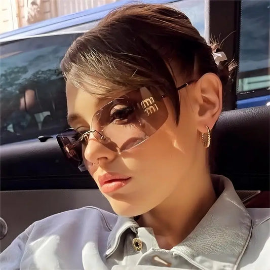 Lianfudai 2024 new sweet cool hot girl metal rimless sunglasses street shoot runway concave modelling glasses senior sense rimless cut edge