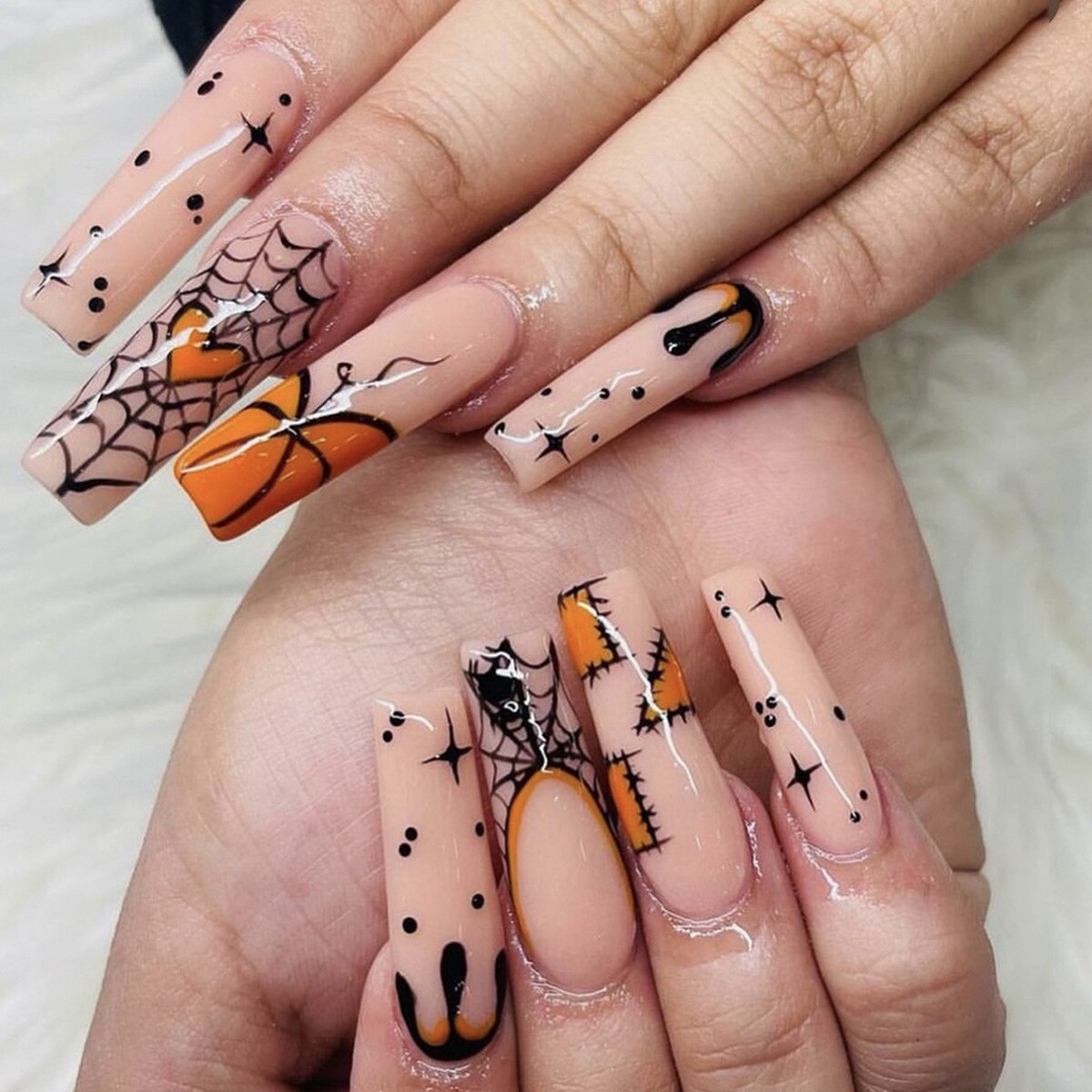 sengpan current nail trends 2023  24Pcs Almond False Nails Halloween Press on Fake Nails with Skull Head Spider Web Ghost Design Ballet Full Cover Nail Tips